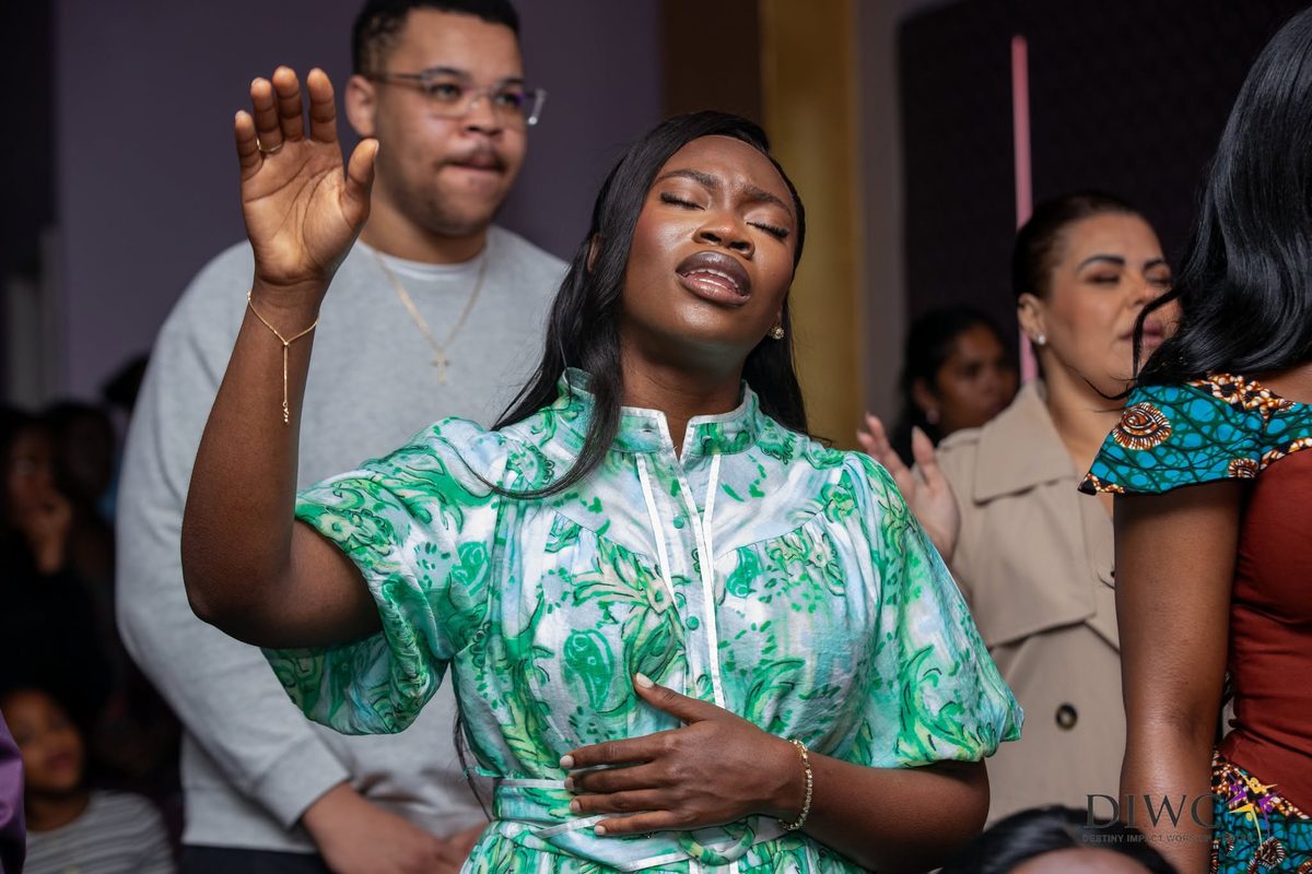 A couple worshipping together
